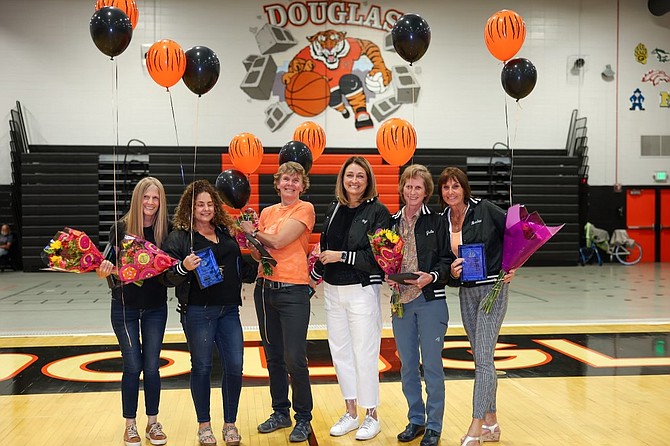 Six members of the 1983-84 Douglas High School volleyball team that won the AAA state title pose for a photo after being inducted into the Tigers’ first Hall of Fame. Pictured from left to right are, Shelley Gardner, Christy Canatsey, Julie Ament, Teya Edwards, Julie Aldax and co-captain Beckie Cattani.