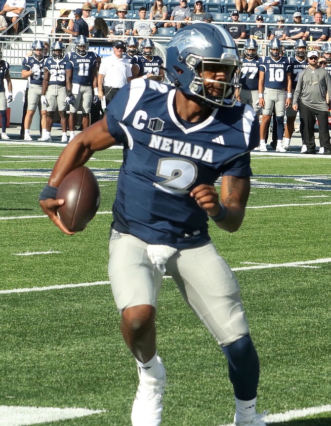 Nevada quarterback Brendon Lewis, shown earlier this season, threw for 151 yards and rushed for 89 more in the Wolf Pack’s loss at Texas State.