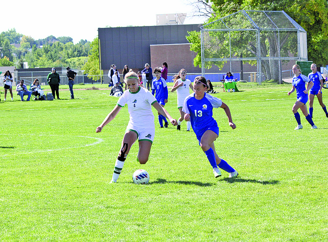 Fallon sophomore Kylee Simper battles for possession in Saturday’s win over Lowry.