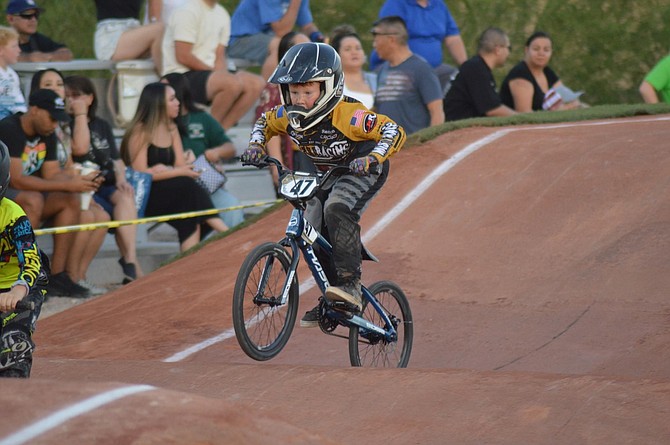 Kasyn Smith clears a rolling jump during a BMX race. Smith and his older brother, Kaleb Frolander, will be competing in Tulsa, Oklahoma in November at an invitational that’s regarded as one of the highest honors in BMX.