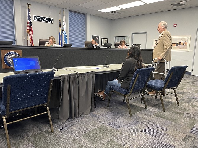 Remedy’s Bar owner Michelle Rodriguez, left, and attorney Justin Clouser at a show-cause hearing before the Carson City Board of Supervisors on Oct. 5, 2023.