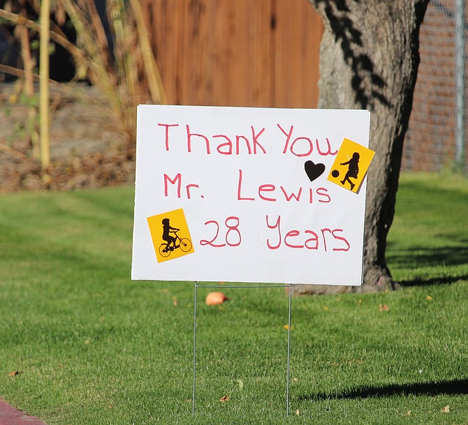 A sign in a lawn along 10th Street expressed support for Superintendent Keith Lewis.