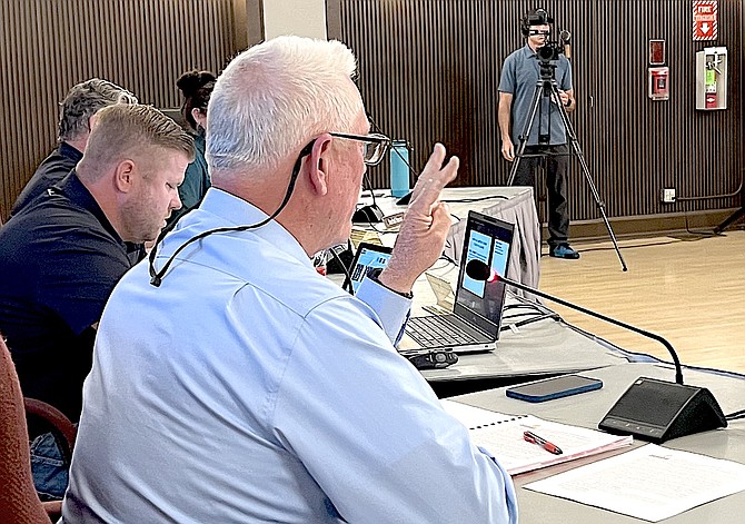 Minden Town Board Chairman Steve Thaler makes a point early on at Wednesday’s meeting to discuss the Minden Siren, as a videographer tapes the session.