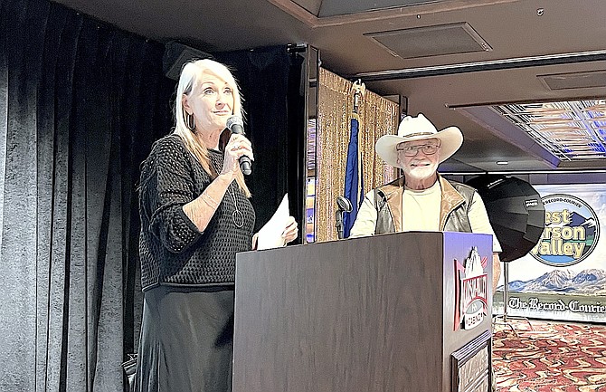 R-C Associate Publisher Tara Addeo presents the award for best photographer to JT Humphrey at Friday’s luncheon.