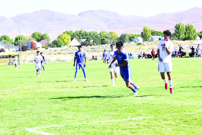 Lowry's Nazerath Razo attempts to head the ball in the goal during Saturday's home match with Elko.