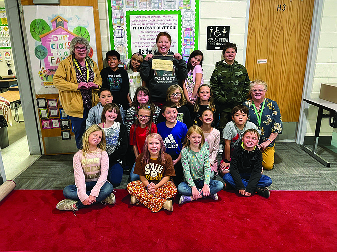 Colleen Tutty's fourth-grade class had the red carpet rolled out for them by Numa student council members.