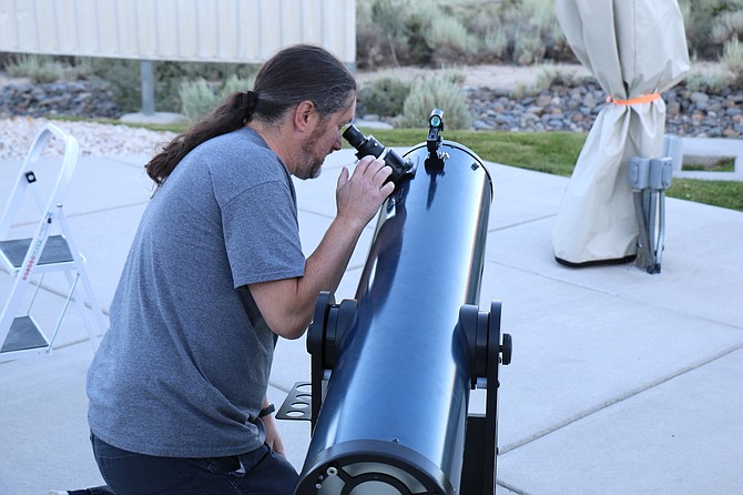 JCDO Observatory Director Thomas Herring prepares the Orion telescope for use on July 29 for a star party.