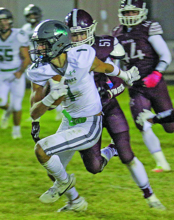 Fallon’s Brady Alves runs down the field during Friday night’s 13-8 loss to Elko.