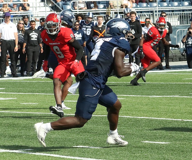 Pack running back Sean Dollars carried 19 times against UNLV on Saturday.
