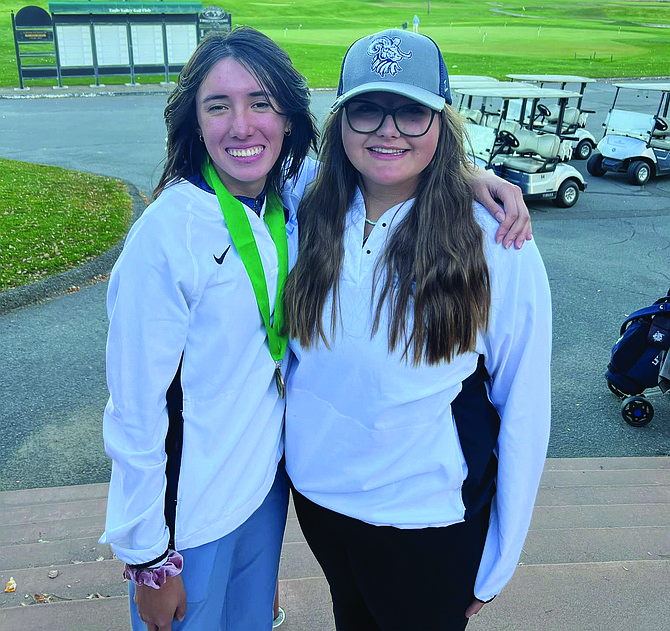 Oasis Academy golfers Olivia Kutansky, left, and Meirra Cavanaugh qualified for this week’s 2A state tournament in New Washoe City.