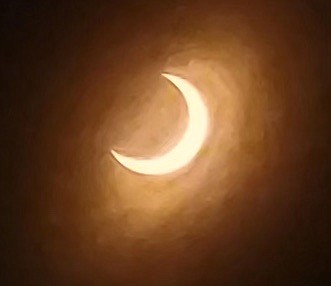 James Moore submitted this photo of the eclipse taken by his granddaughter Carly Dickens on Saturday.