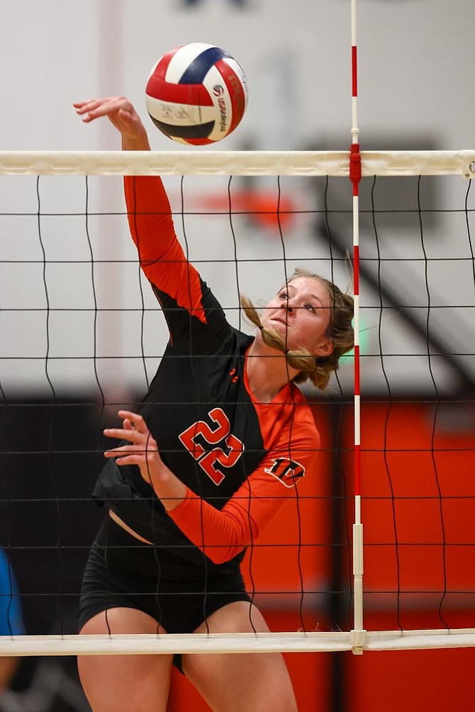 Douglas High senior Megan Kelly goes up for a kill against Galena Tuesday night in Minden.