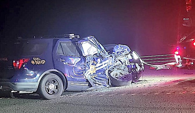 A Nevada Highway Patrol trooper's vehicle after it was struck by a wrong-way driver on Friday night. The trooper pulled in front of the driver.
