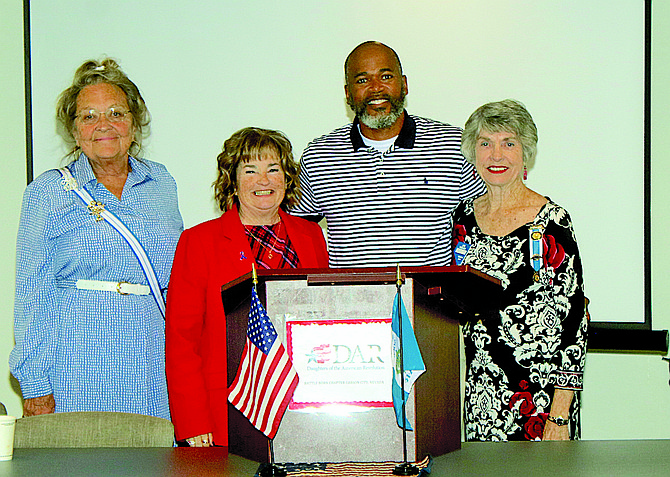 Michael Music Jr., second from right, spoke at last week’s Daughters of the American Revolution meeting about crisis intervention and drug abuse awareness. From right are DAR members Lynn Kinsell, Lori Bagwell, Music and Jan French.