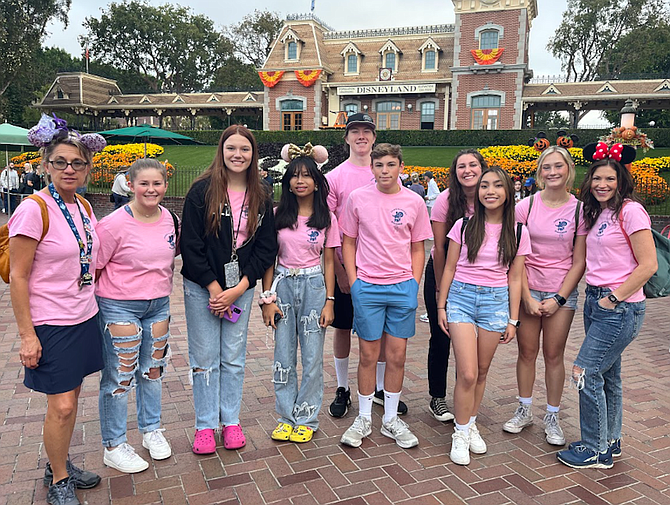 From left at Disneyland: Page Hiskett, Emily Dunkin, Kiera McCoy, Lyannrose Goss, Ethan Mitchell, Dallin Sorensen, Alyssa Ayers, Jilliana Moreales, Ruby Hiskett and Kim Sorensen.