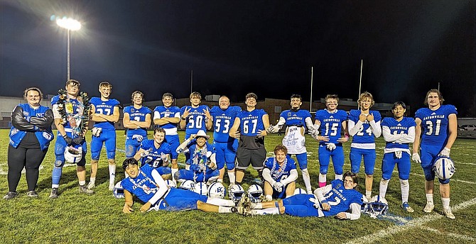 Eatonville's football seniors pose following their 44-0 victory over Elma.