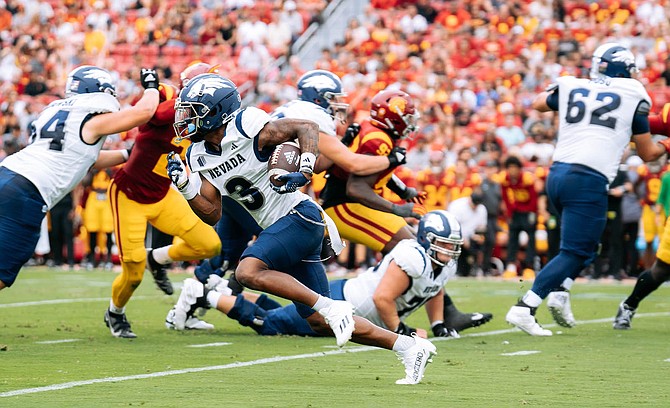 Nevada’s Jamaal Bell, shown earlier this season, has seen action at receiver and running back this season.