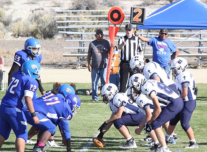 Lineman get set during Sierra Lutheran High’s football game last weekend at McDermitt. Pictured are center Logan Whittington (66), guard Clayton Jones (77), Logan Williams (88) and Tristen Dries (81). The Falcons beat the Bulldogs, 20-8.