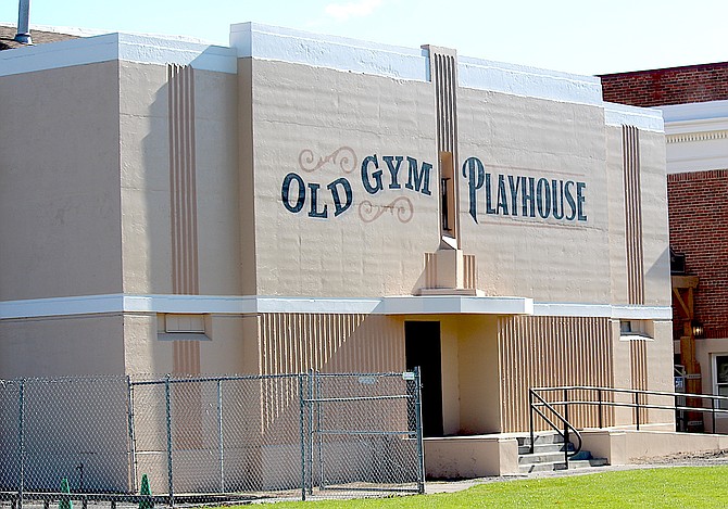 The final touch to the Old Gym Playhouse was to paint its name. Built during the Great Depression with help from the Works Progress Administration, the gym was a needed expansion for what was then Douglas County High School.