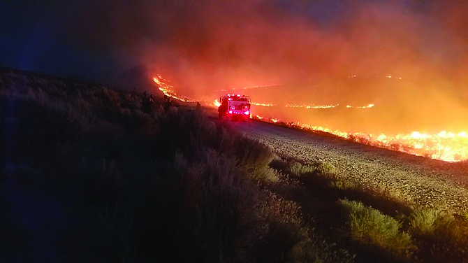 Sebastian Christianson • Sawtooth Interagency Hotshot Crew
Crews battle the 2018 Martin Fire outside Winnemucca, one of the largest in the state’s history. At times, the fire had a 25-mile front that moved 11 miles per hour.