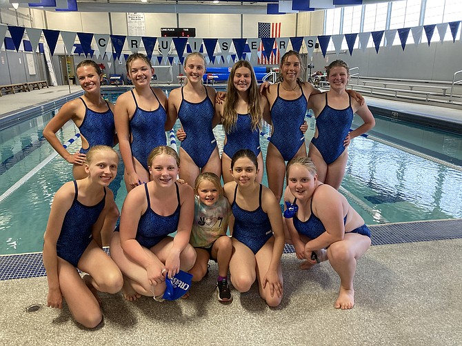 Eatonville's swim team will send nine of its 10 members to compete at the district meet. Back row: Reese Zurfluh, Nicole Tomyn, Gracie Forsman, Jaliah Vinson, Kaylee Bernt and Annika Howard. Front row: Charlotte Stumph, Lily Hays, Mascot Jovi Stammen, Victoria Boren and Morgan Wendell.