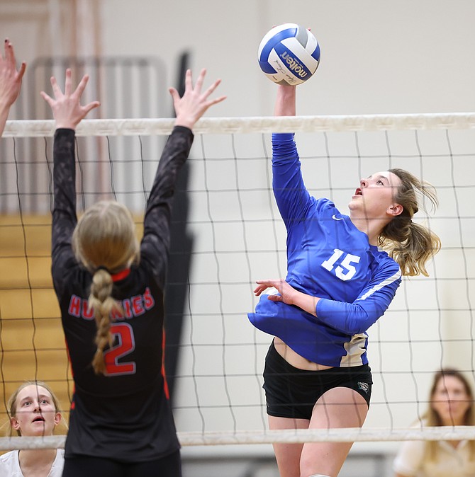 Carson High's Abby Franco connects with a kill, during the Senators' Class 5A north regional semifinal matchup against top-seeded Reno.