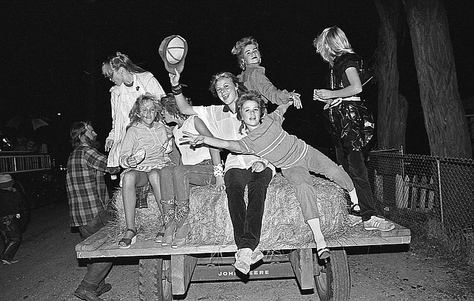 Forty years ago, Genoa children enjoy the Halloween hayride that took them through town in 1983. The hayride was back on Tuesday night, courtesy of the Borges.