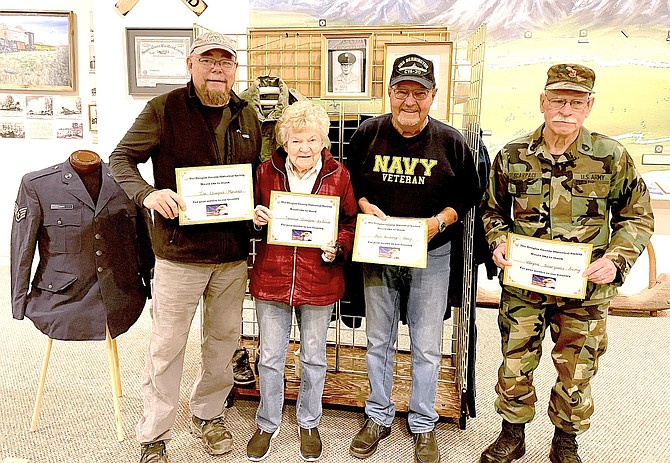 Veterans Jim Glimpse, mother Florence Glimpse, Neil Koneony and Wayne Scarpaci participated in the 'Everyone Has A Story' presentation by Historical Society Education Director Kay Kocian on Saturday at the Carson Valley Museum & Cultural Center. Photo special to The R-C by Virg Towner