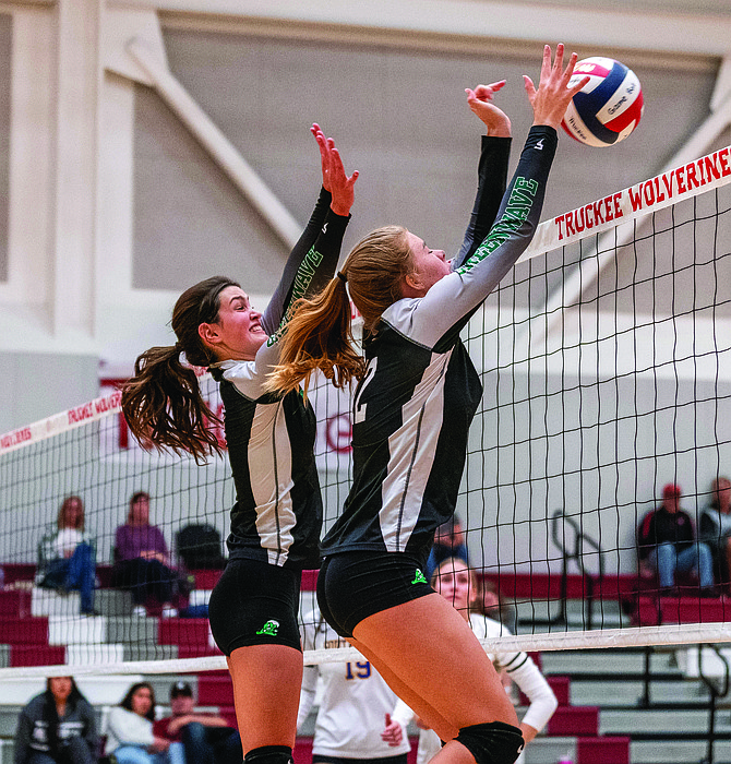 Fallon’s Halle Johnson, right, blocks a South Tahoe kill attempt along with teammate Kiley Wallace in the fourth game Friday.