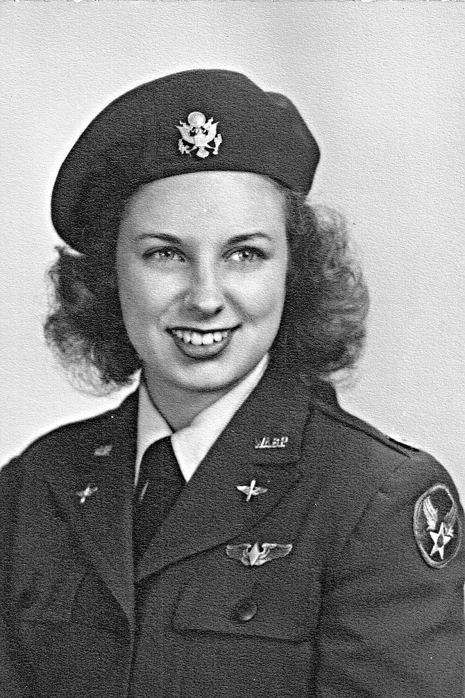 Hazel Stamper Hohn smiles in her 1944 Women's Airforce Service Pilot blue uniform. She flew a few B-24 four-engine bombers from the factory to USAAF bases during the war. Hazel raised her two daughters in Carson City.