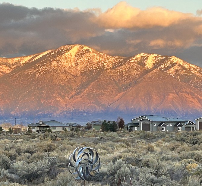 Phyllis Hogan captured this photo of snow on the Carson Range at sunrise on Tuesday morning.