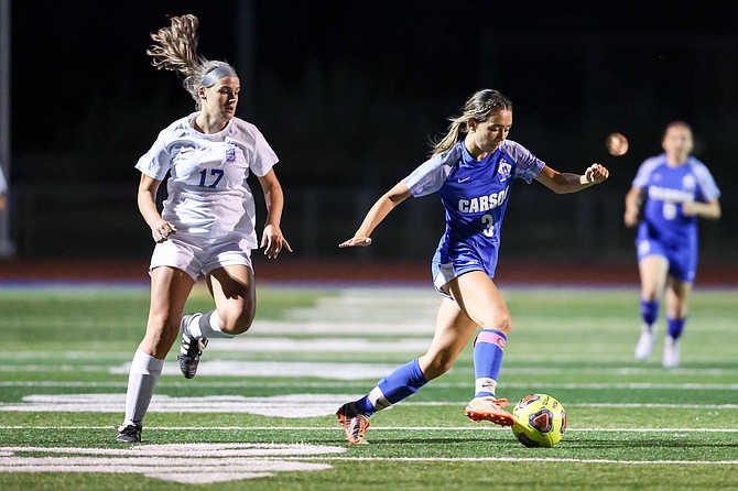 Carson High junior Addison Morgan dribbles away from an opponent earlier this season. Morgan was named as a first-team all-league midfielder for the second season in a row.