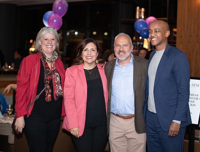 Claudia Balducci, Teresa Mosqueda, Jorge Barón, and Girmay Zahilay celebrate their wins for King County Council on election night at the Westin Hotel in downtown Seattle.