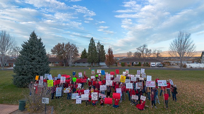 At least 80 people including parents, teachers, students, grandparents and community members marched Monday to voice recent community concern of the Douglas County School Board.