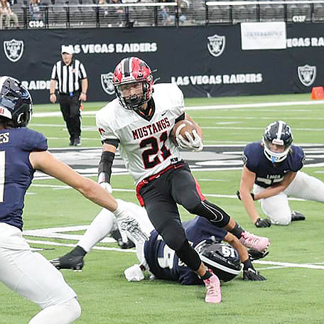 CONNIE GOTTSCHALK • Provided to Great Basin Sun
Denzel Zaldivar runs the ball for the Mustangs.