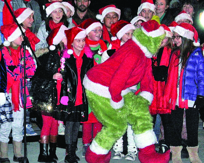 The Grinch is a beloved character appearing at the Silver & Snowflakes Festival of Lights.