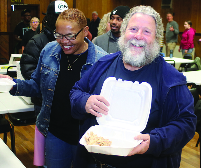 Navy Command Senior Chief Cheryl Heavens, left, and Navy veteran Mike Hall, a member of American Legion Post 16, have a laugh as they begin to fill their Styrofoam containers.
Additional photos may be found on the LVN Facebook page.