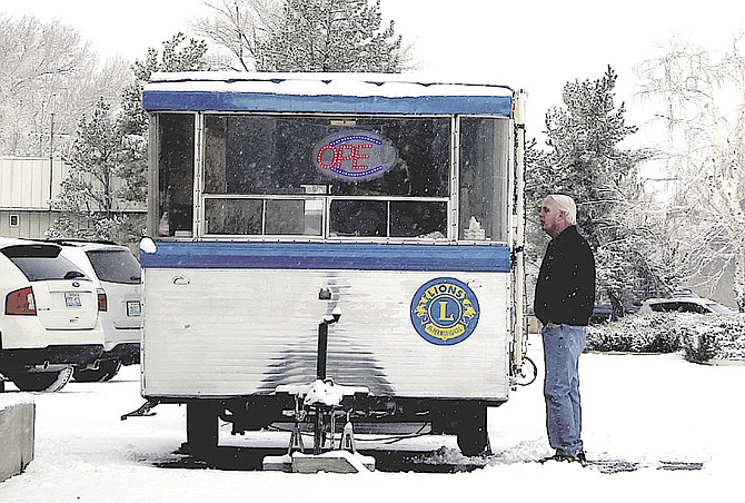 Rain, snow or shine, the Lions Club will be selling See's Candy out of their little trailer at Frontier Communications through Christmas Eve or until they run out.