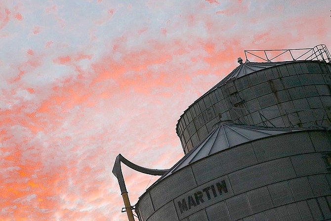 The Settelmeyer silo stands in contrast to a red mottled sky last week. We might be getting more color in the skies on Wednesday as a couple of new fronts arrive.