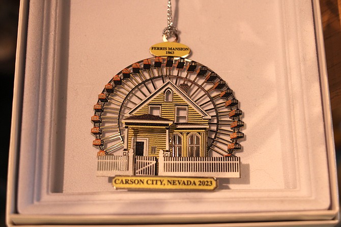 Carson City’s 2023 Christmas ornament showing the Ferris Mansion as displayed at the Purple Avocado on Dec. 5.