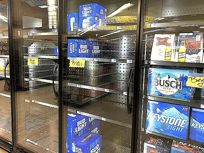 Beer was half-off at the Rite Aid on Thursday.