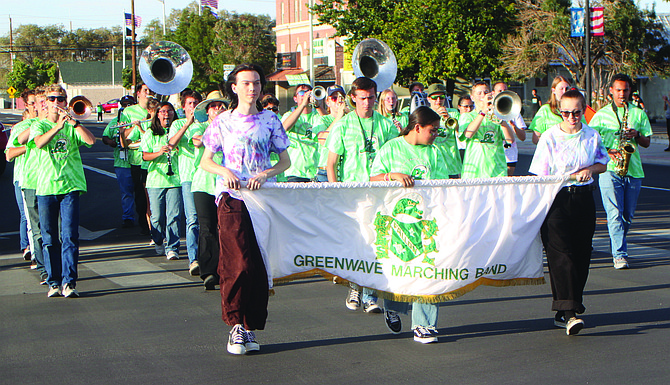The Churchill County High School Marching Band participates in the 2023 Greenwave Homecoming parade.