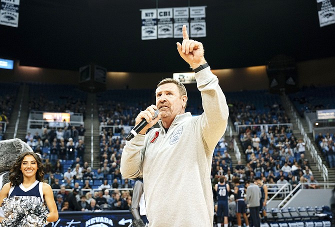 New Wolf Pack football coach hypes the crowd at a recent Nevada basketball game at Lawlor Events Center.