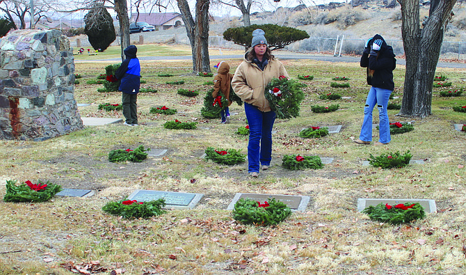 Volunteers remember veterans at the Churchill County Cemetery during the 2022 Wreaths Across America ceremony.