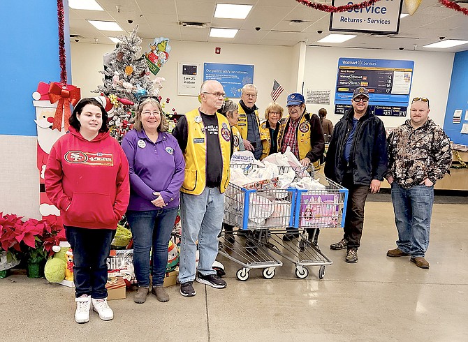 Carson Valley Lions went shopping for Project Santa Claus at WalMart on Saturday morning. Photo special to The R-C