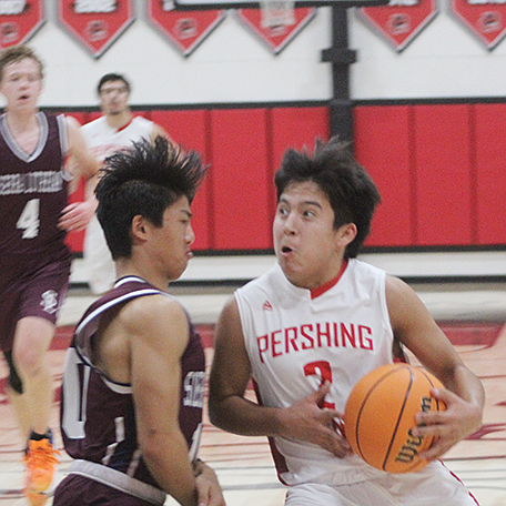 Trenton Rhodes gets past Sierra Lutheran to score for the Mustangs last Tuesday at PCHS.