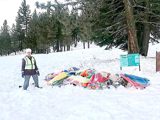 Ongkar Khalsa team Uppaway leader with collected trash at Sled Hill.
Tahoe Daily Tribune photo