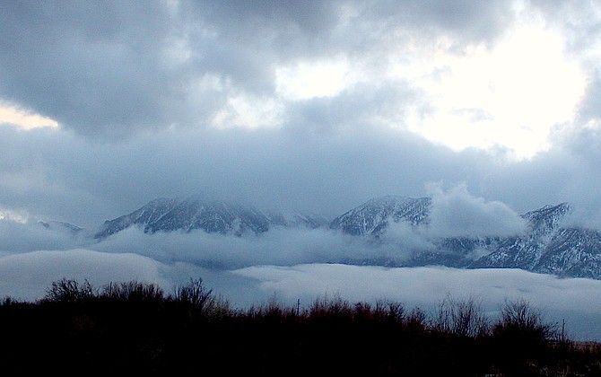 Hanging clouds obscure Jobs Peak on Monday evening.