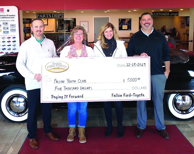 Fallon Ford-Toyota awarded proceeds from the 2023 Pay It Forward program to 14 local nonprofit groups, including this $5,000 check for the Fallon Youth Club. From left are Joe DeAloia, Shannon Goodrick, Missy McCormick and Tim Mitchell.