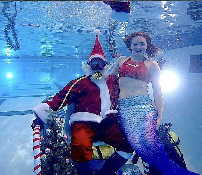 One last Santa Claus picture to wrap up Christmas, this one from Carson Valley Swim Center's underwater Santa with lifeguard Abbigail Detsch taken by Justin Gross.